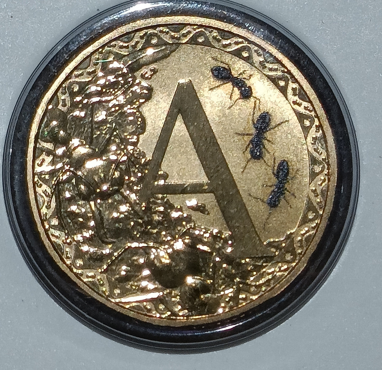 2015 $1 Coloured Frosted Uncirculated Coin Letter "A"