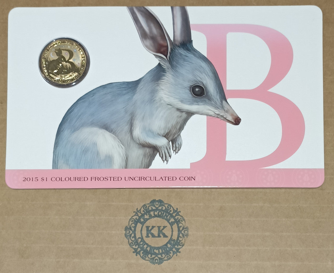 2015 $1 Coloured Frosted Uncirculated Coin Letter "B"